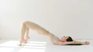 Supported Bridge Pose: A Gentle Stretch for Relaxation and Stress Relief