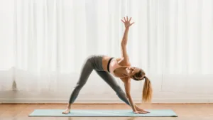 Triangle Pose (Trikonasana): Stretches the entire body, improves balance, and can reduce stress.