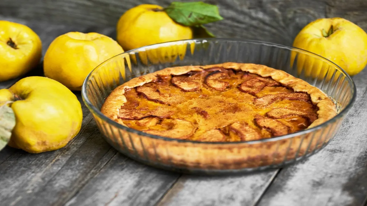 Homemade Apple Quince Pie With Fresh Fruits On Rustic Wooden Bac