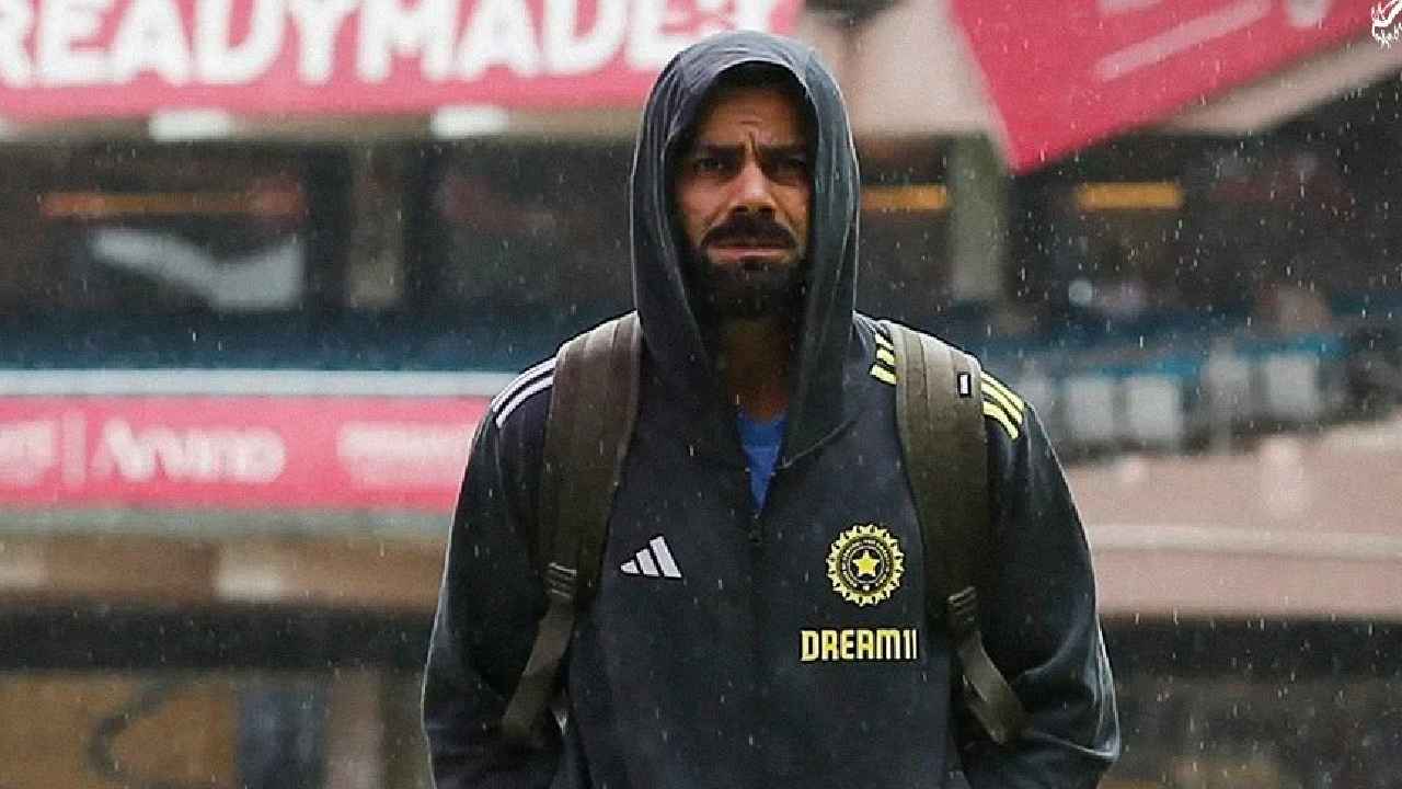 Virat Kohli black raincoat look...