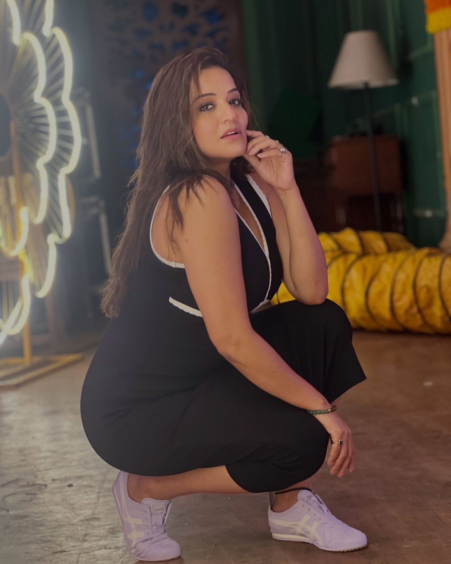 Monalisa Stuns in Black Deep-Neck...