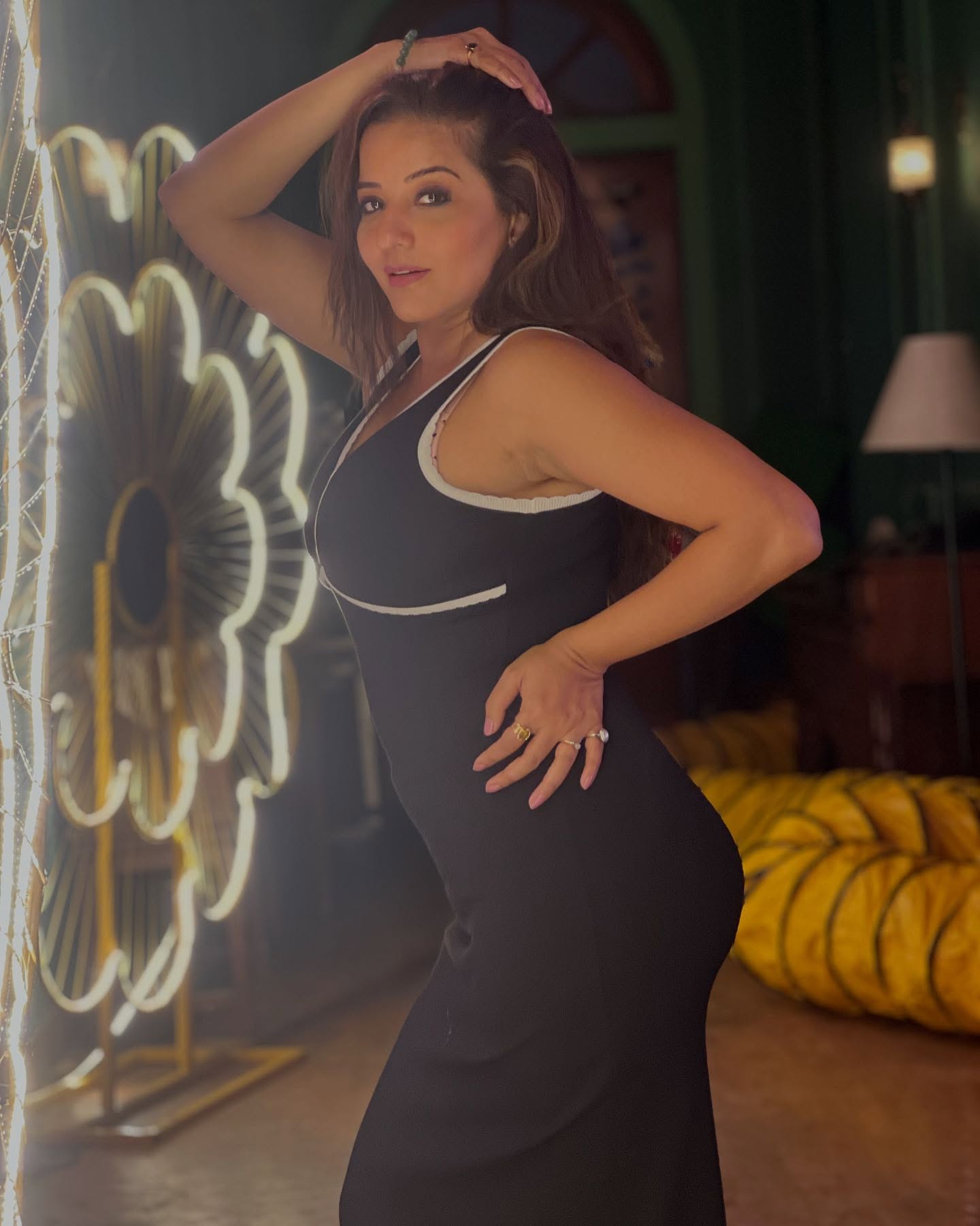 Monalisa Stuns in Black Deep-Neck...