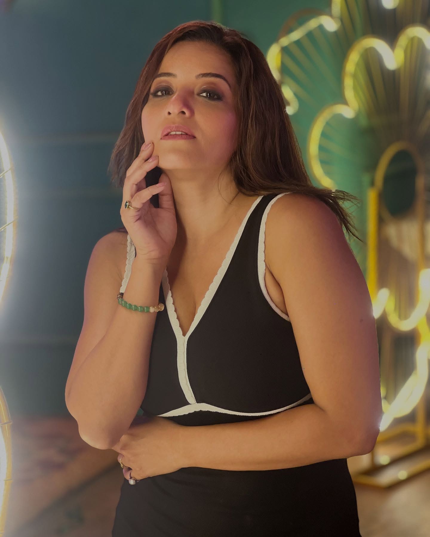 Monalisa Stuns in Black Deep-Neck...