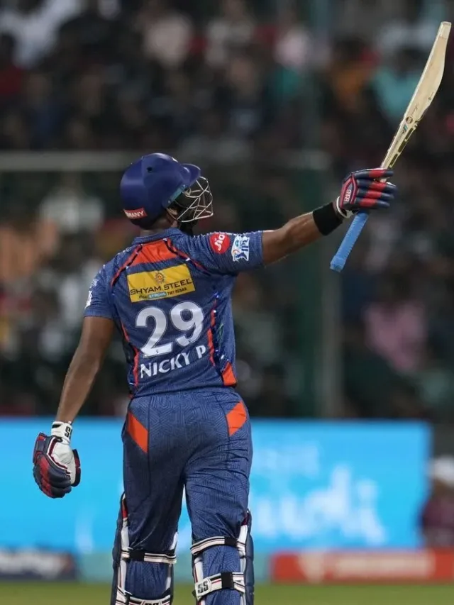 Nicholas Pooran throws his pad in frustration