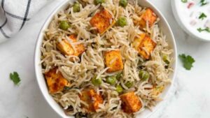 Peas and Paneer Pulao : लंच के लिए बनाएं बिरयानी स्टाइल मटर-पनीर पुलाव स्वादिष्ट और आसान रेसिपी