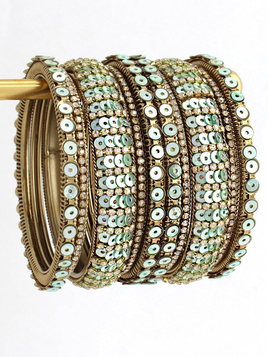 Green Bangles Look Incomplete Without...