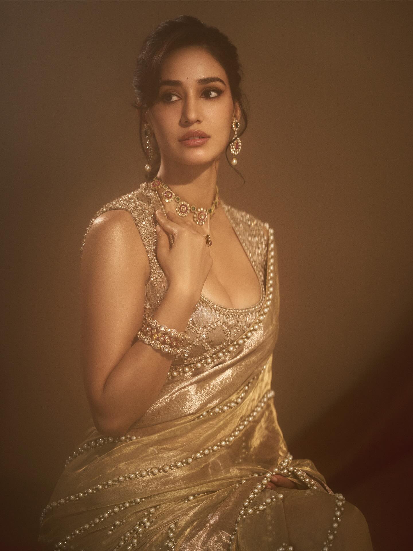 Disha Patani Gorgeous Golden Saree...